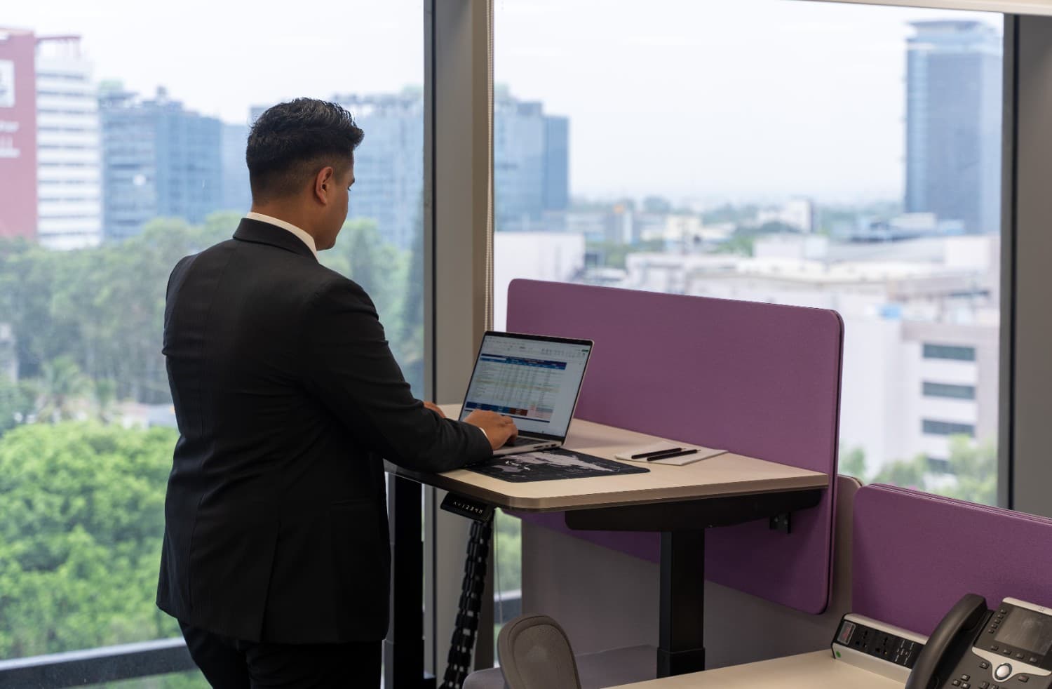 A workstation area in The Earth Centre, showcasing modern desks and ergonomic chairs in Bangalore