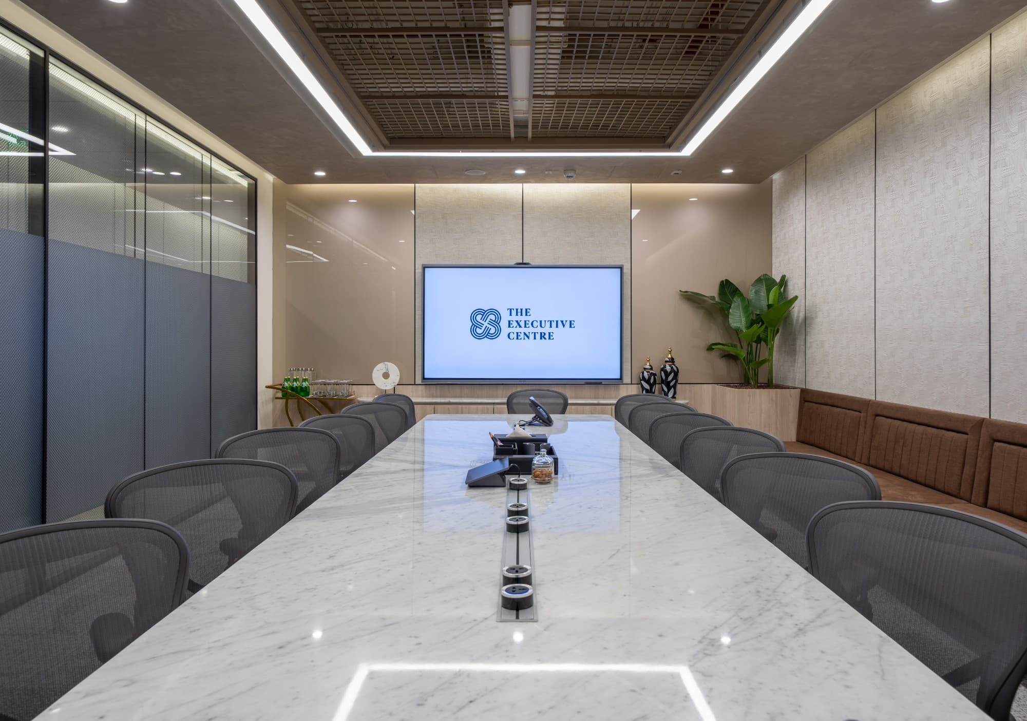 Meeting Room Board Room at The Earth Centre in Bangalore, featuring a large table and modern seating