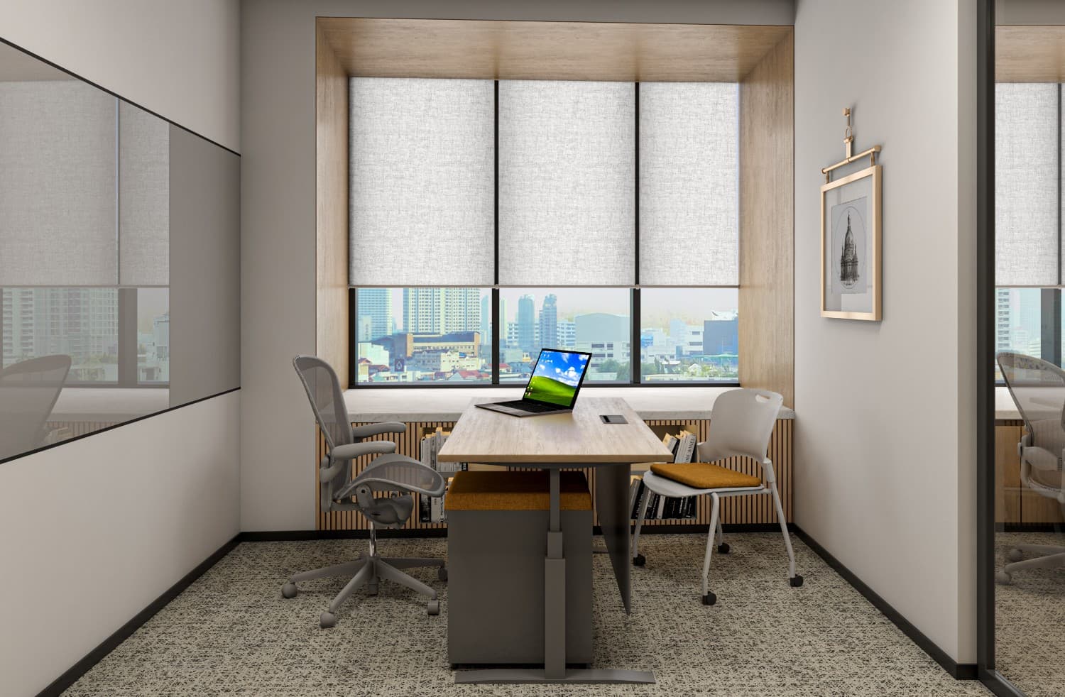 Workstation setup in Raheja 3F, featuring ergonomic chairs and desks in a collaborative workspace