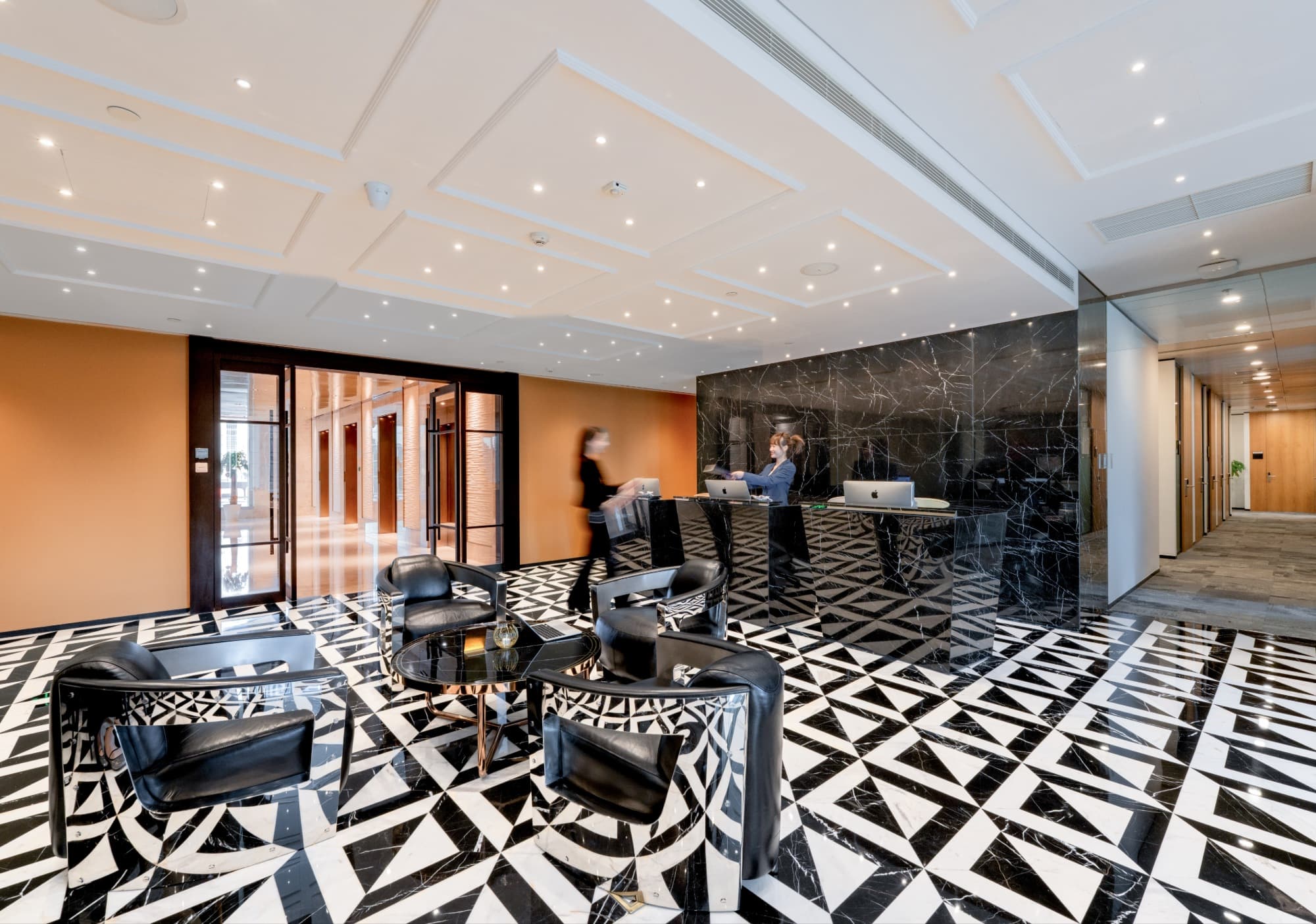 Reception area at The Executive Centre Jingan Kerry Centre Tower 2 showcasing sleek design and modern workspace amenities in Shanghai