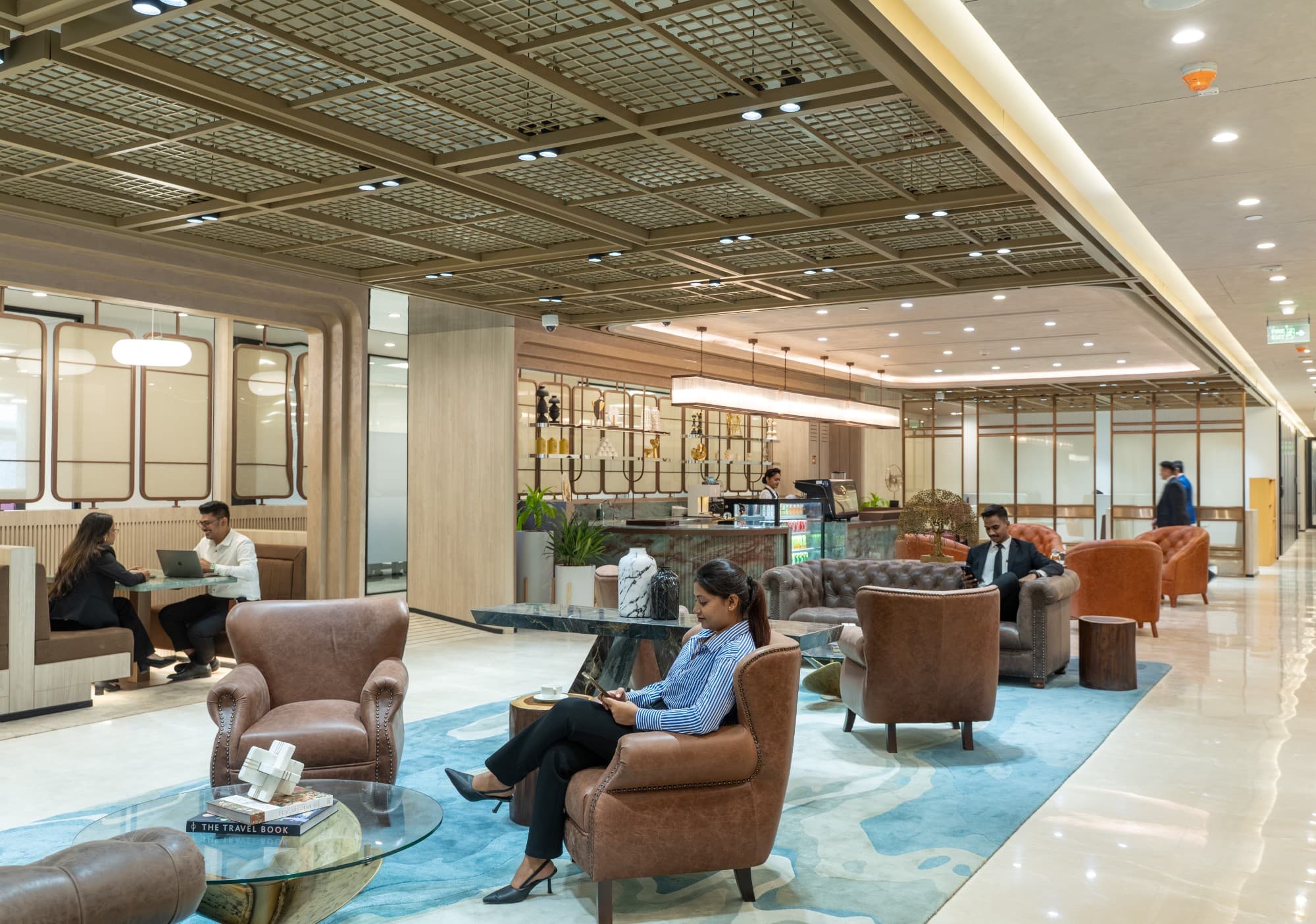 Modern lounge interior at The Earth Centre in Bangalore, featuring contemporary furnishings and a relaxed atmosphere
